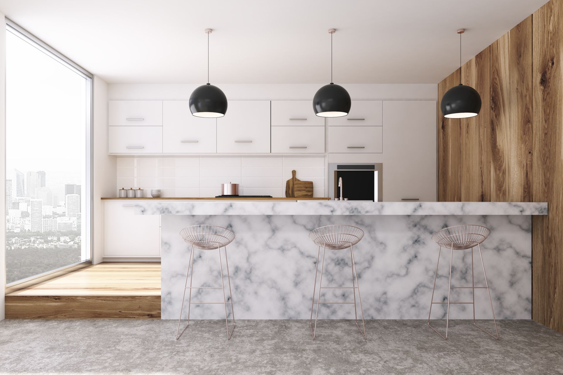 Cocina en mármol blancon con un gran ventanal como ejemplo del máster en interiorismo y decoracion online de INNADI, Madrid